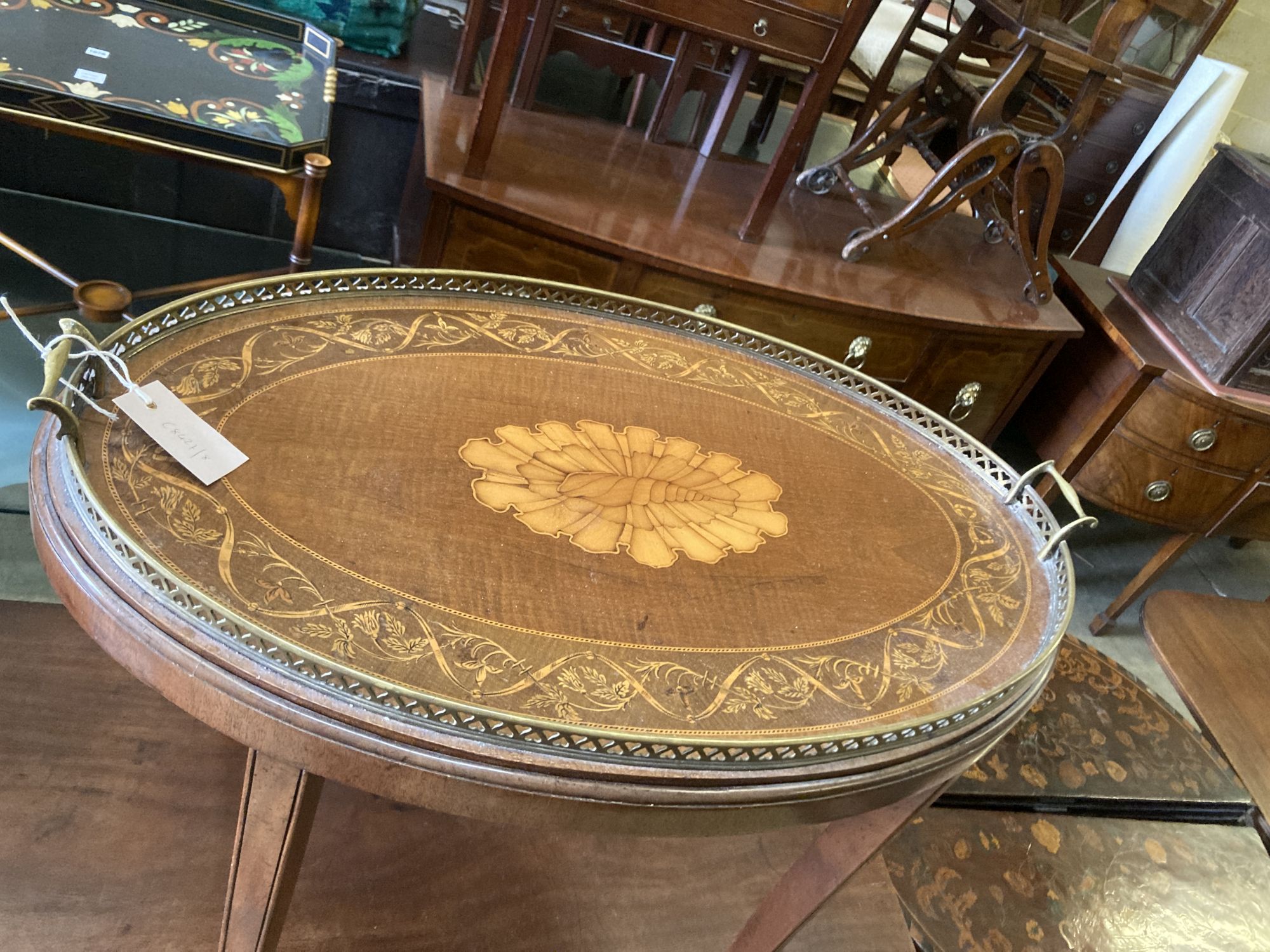 An Edwardian inlaid oval tray top, on later stand, width 70cm depth 46cm height 57cm